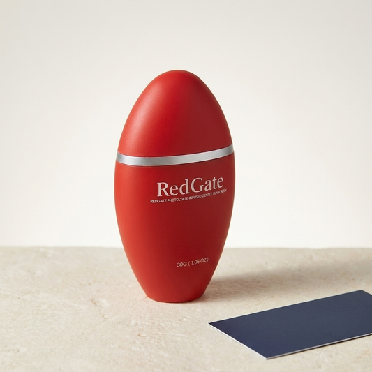 Redgate Sunscreen Cream, alternate angle of the red bottle with navy accent card