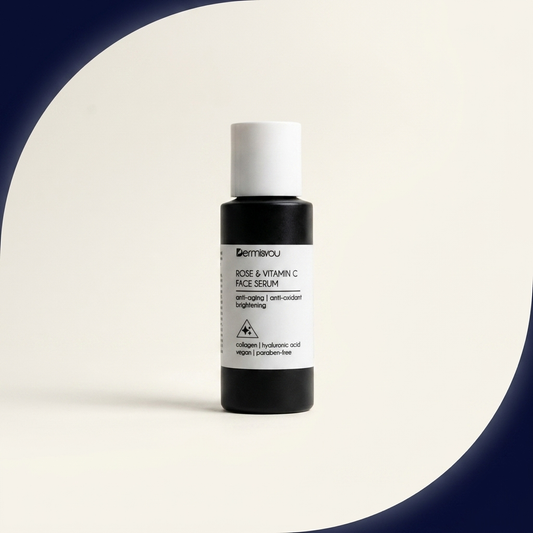 EF_rose-vitamin-c-serum_02_angle - Dermisyou Rose & Vitamin C Face Serum bottle at a three-quarter angle with soft navy accent styling